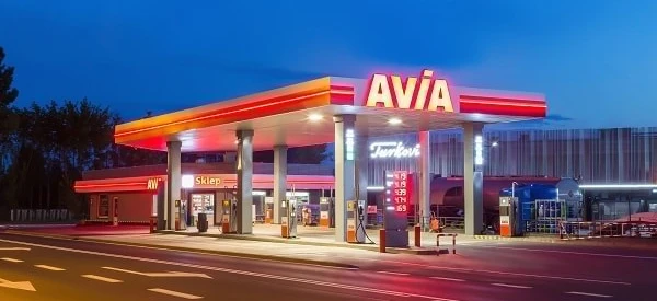Electronic signage at an AVIA fueling station advertising gasoline and other products. Sklep (store) available for convenience at Turkovi, SD Eibar.