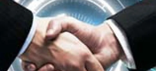 A symbolic handshake between two hands, representing collaboration and management in the field of graphic design.